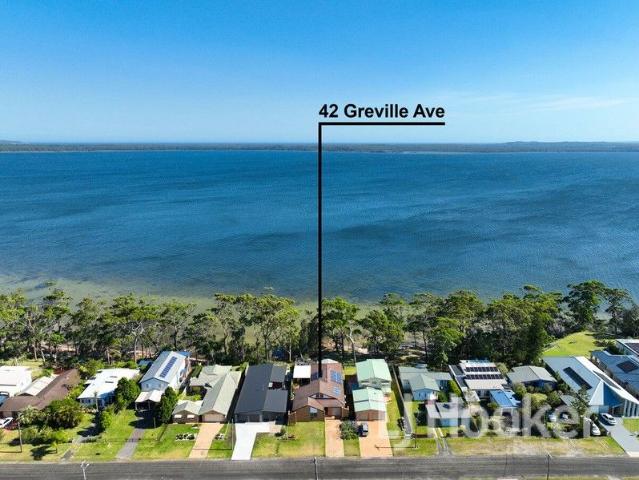 Waterfront Reserve Living with Dual Accommodation and Boat Shed