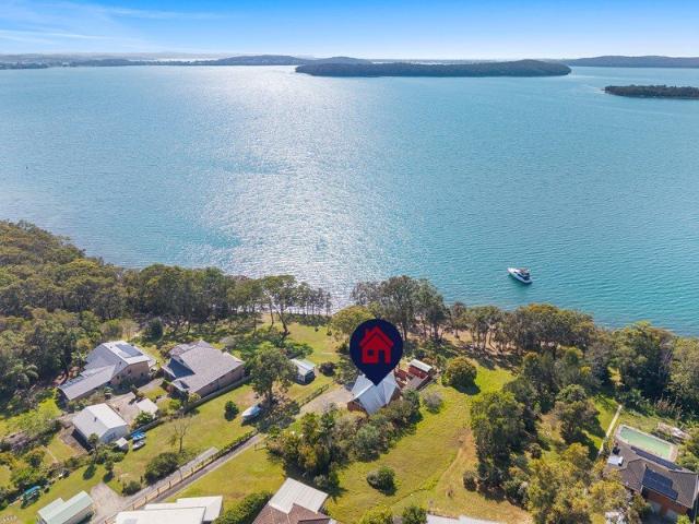 Waterfront Reserve Opportunity with Stunning Lake Views