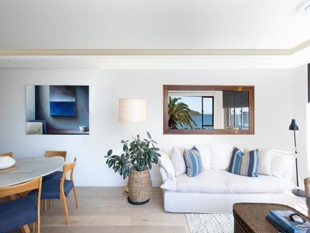Waterfront two bedroom sanctuary with Balmoral Beach access, sweeping harbour panoramas and parking $3,500/week fully furnished including bills
