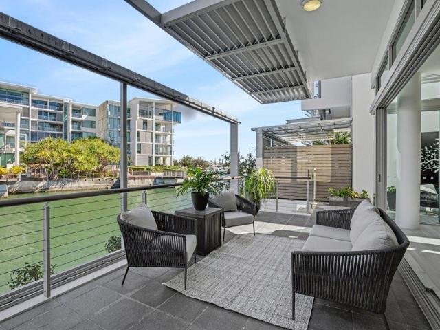 Waterfront Villa with Private Basement Garage Sophisticated Design Meets Coastal Luxury!