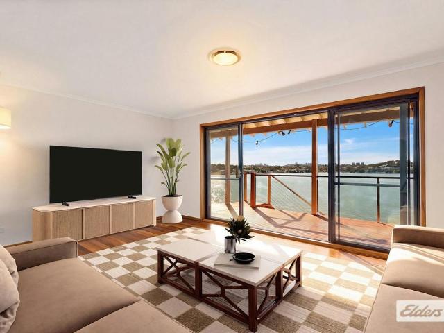 Waterfront with jetty, pontoon, boatshed and slipway