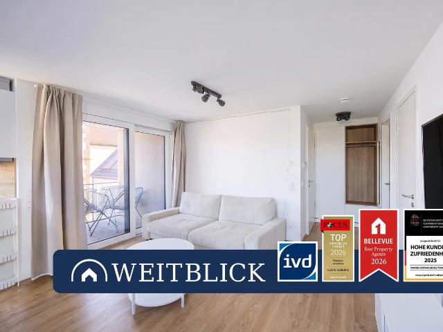 WEITBLICK: 2–Zimmer–Maisonette mit Arbeitsgalerie und Loggia