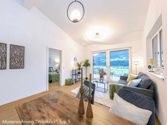 WEITBLICK W3: traumhafte 2 Zimmer Wohnung in Sonnenhanglage mit unverbautem Panoramablick und Privatgarten