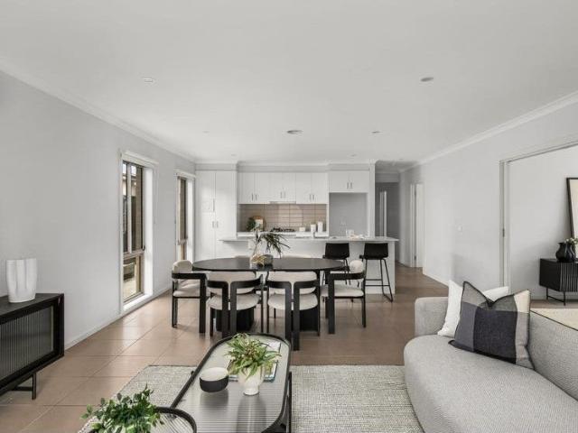Welcome Home to Relaxed Luxury in Greenvale