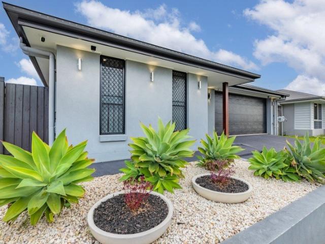Welcome to a home where modern luxury meets ultimate peace and privacy