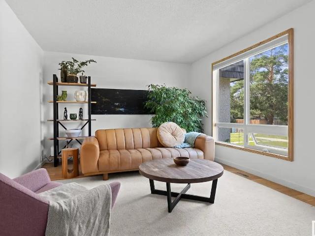 Welcome to this beautifully RENOVATED 4 bedroom, 2 bathroom townhouse