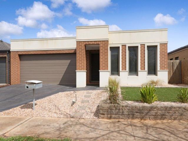 Welcome to this meticulously maintained 3 bedroom, 2 bathroom home