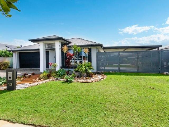 Welcome to your new home in the prestigious Pacific Harbour Golf Course Estate