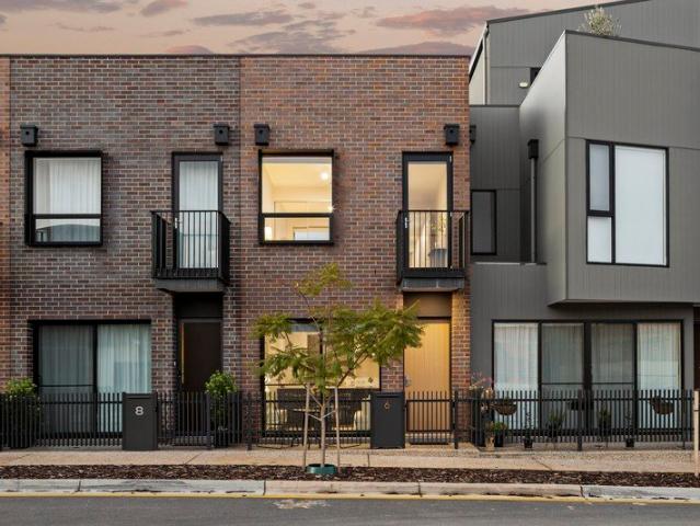Welcome To Your New Place, Trendy Vibrant Townhouse Living in the Heart of the Port!
