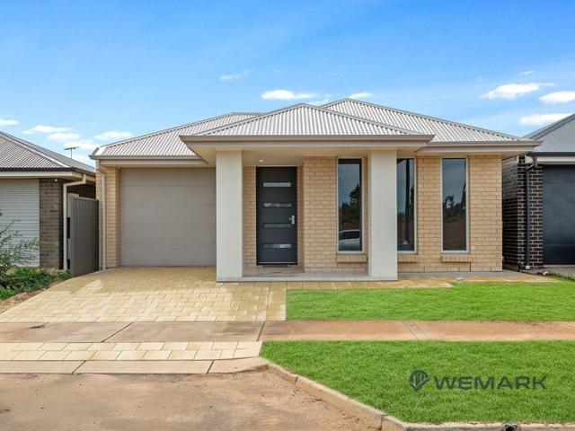 Welcome to 12 Tudorvale Drive Your Cozy Haven in Munno Para West!