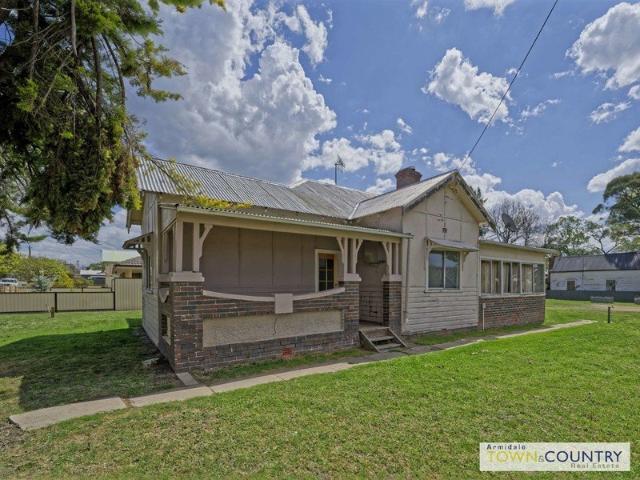 Welcome to 91 Bridge Street, Uralla! This property is exactly what you need  updated inside with a large yard