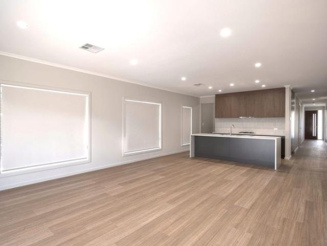Welcoming and light filled, this spacious and thoughtfully designed home is sure to impress