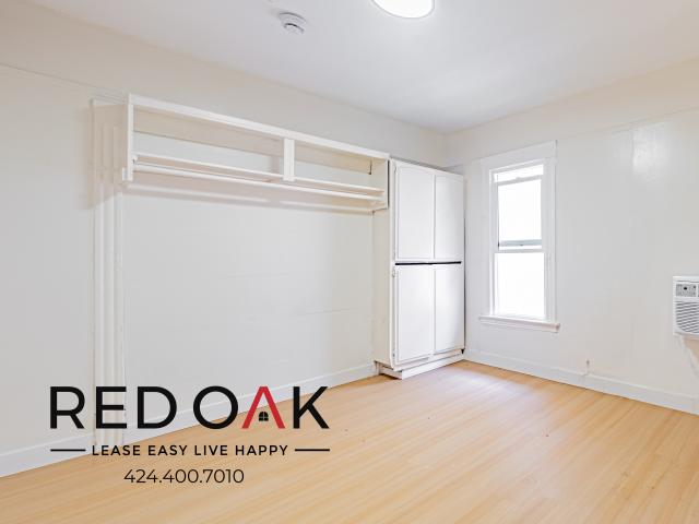 Welcoming Studio with Built In Shelving and Eat In Kitchen ~ In Prime San Pedro!