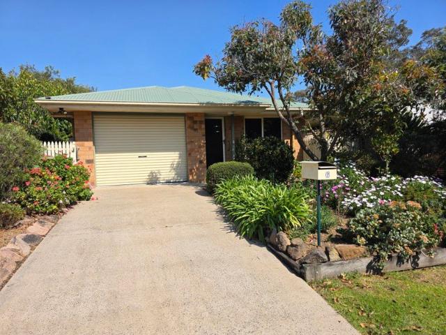 Well Maintained Brick Home in a Lovely Setting