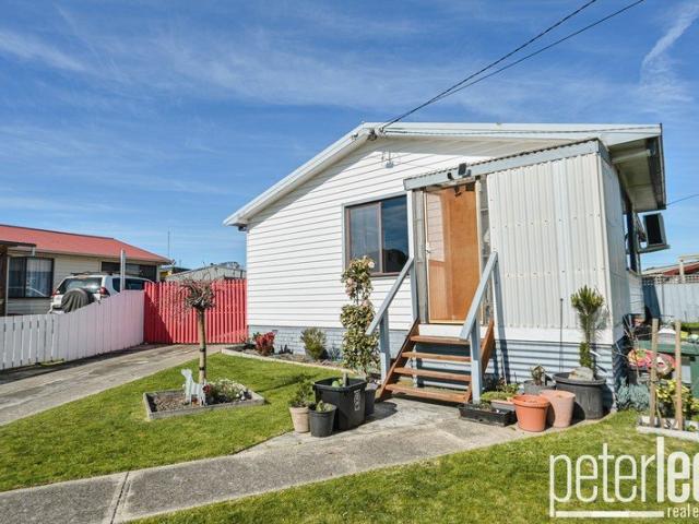 Well Maintained Three Bedroom Home with Great Outdoor Living
