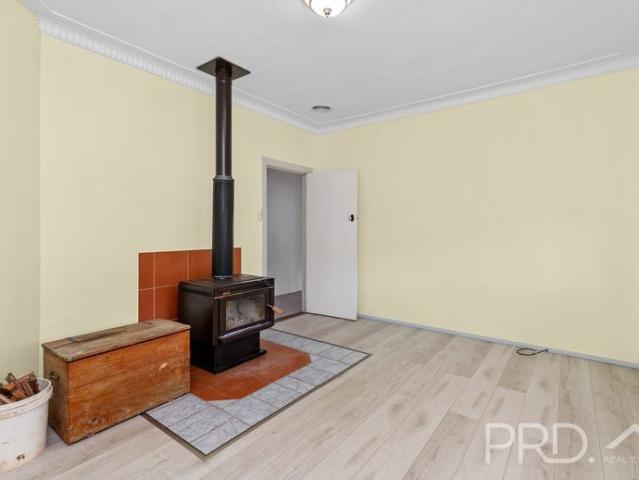WELL MAINTAINED THREE BEDROOM HOME