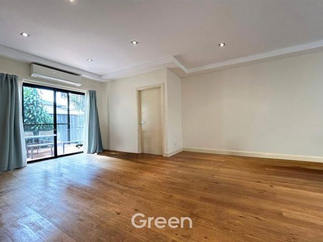 Well Appointed Three Bedroom Townhouse with Tandem Garage and Workshop/Storage Area