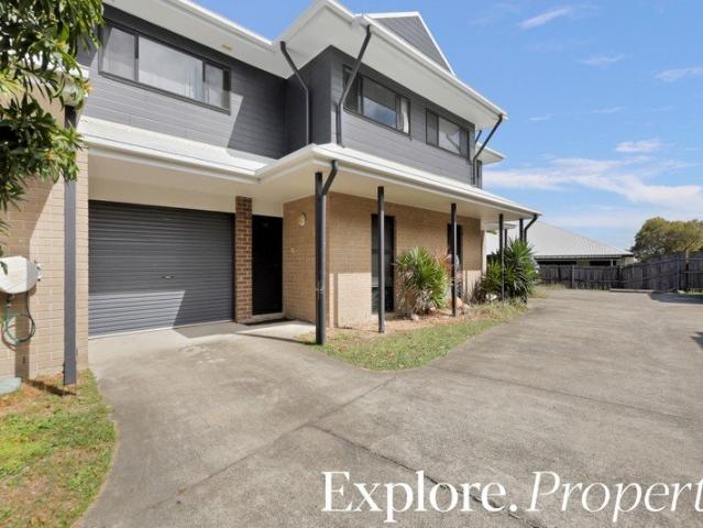Well appointed townhouse in private complex