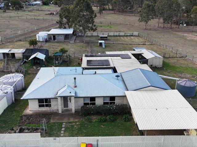Well Equipped 2.11ha 5.26 acres Acreage with Extensive Shedding, Stables & Water