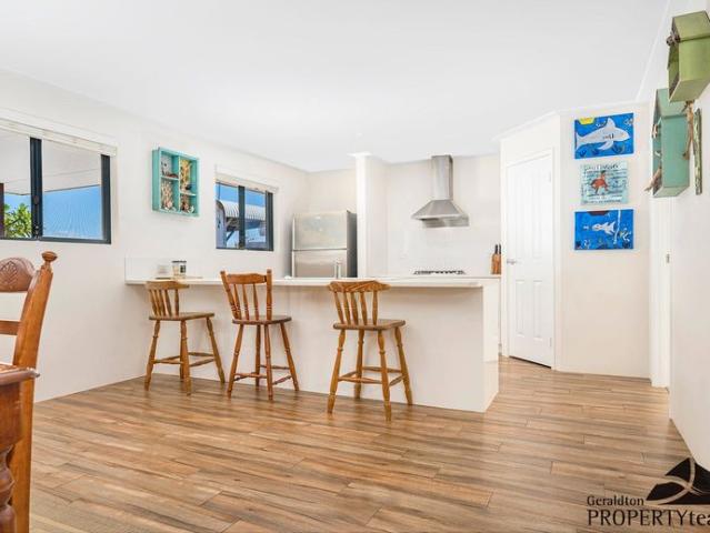 Well established home right near the beach & park!