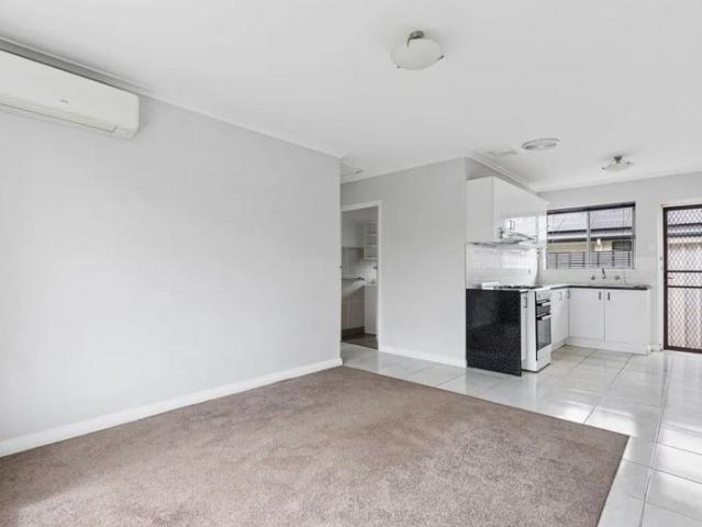 Well Located 2 Bedroom Unit with Private Yard