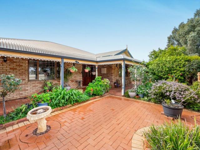 Well Located, Brick Three Bedroom Home!