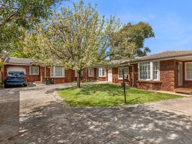 WELL LOCATED, IMMACULATE, TWO BEDROOM UNIT