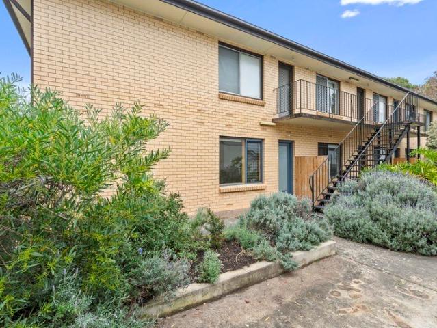 Well located unit featuring private courtyard