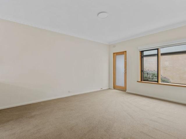 Well located unit featuring private courtyard