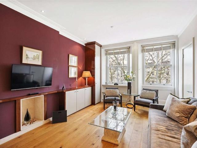 Well presented third floor flat finished in a contemporary style with two bedrooms, two bathrooms and leafy views over Rutland Gate close to Hyde Park and the amenities in Knightsbridge