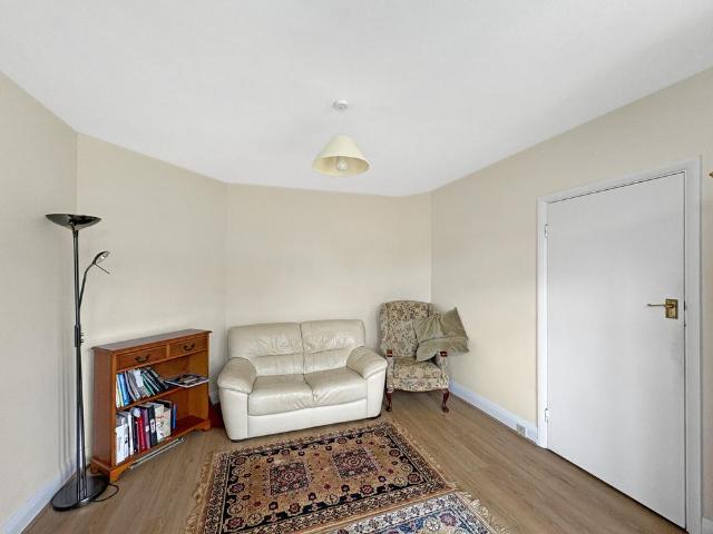 Well presented three bedroom semi detached house set back from the road with ample driveway parking