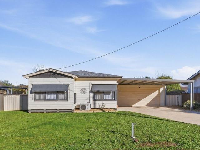 Well Presented Family Home with Exceptional Covered Parking & Workshop