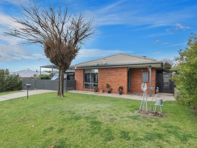 Well Presented Family Home with Exceptional Shedding