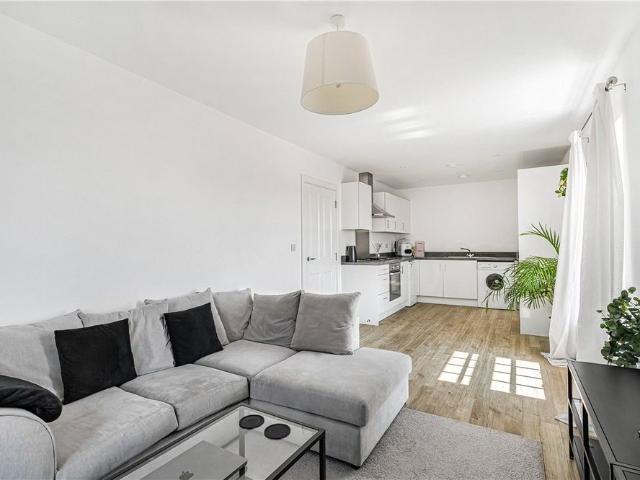 Well presented second floor apartment with off street parking space
