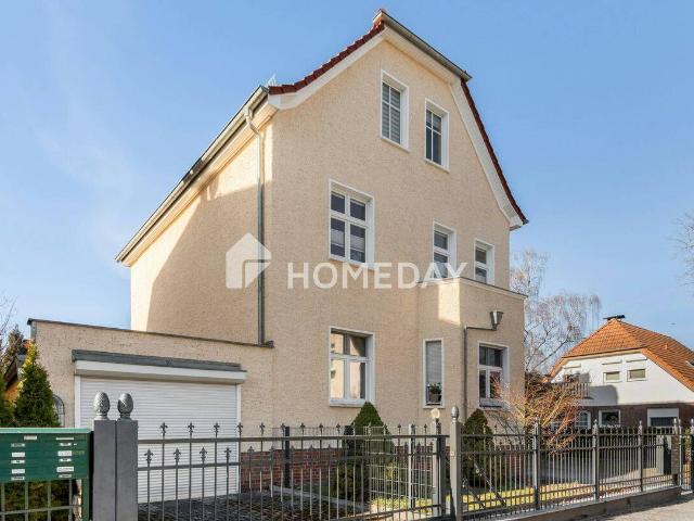 Wertbeständiges Mehrfamilienhaus mit drei vermieteten Wohneinheiten auf großzügigem Grundstück