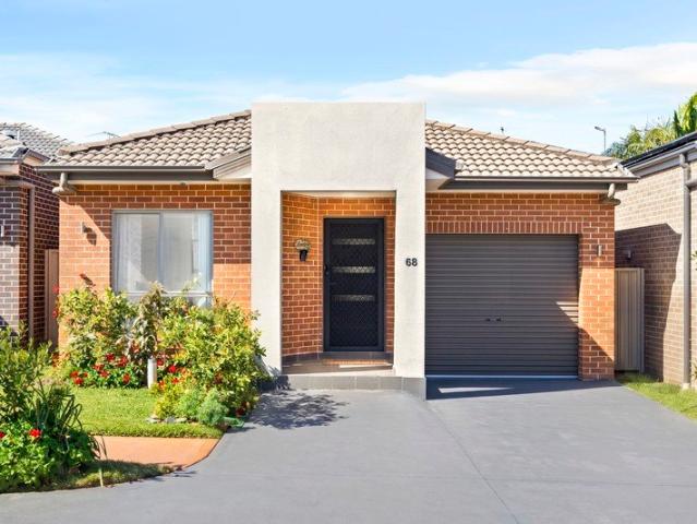 West Facing, Sun Drenched Family Home in Prime Schofields Location!