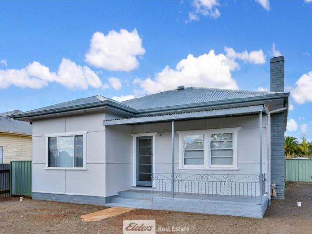West Griffith Home Lawn & Garden maintenance included!