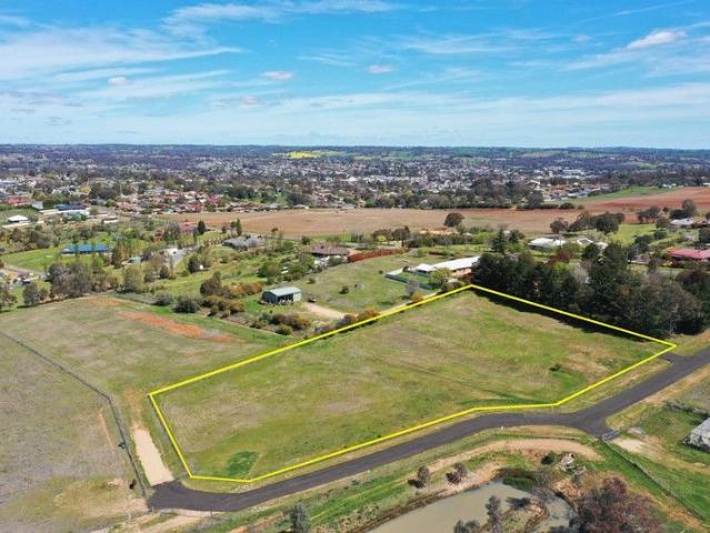 What a Beauty Fully Serviced 2.49 Acres!