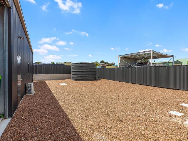 Where Coastal Living Meets Shepartment Style Home and Shed