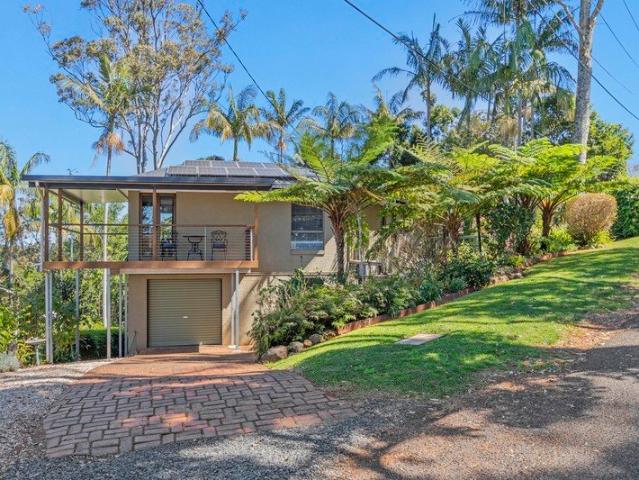 Where Coastal Vistas Meet Mountain Charm: A Garden Sanctuary in Olde Eagle Heights