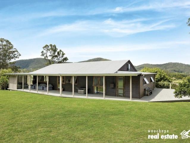 Where Country Living Meets Riverfront Serenity