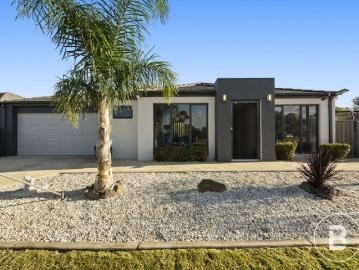 WHERE FAMILY COMFORT MEETS MODERN LOW MAINTENANCE LIVING