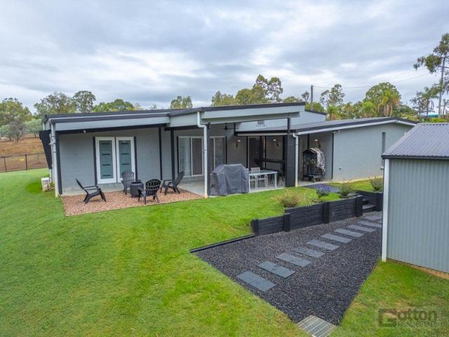WHERE MODERN STYLE MEETS RURAL CHARM ON 5.38 ACRES OF PURE TRANQUILLITY
