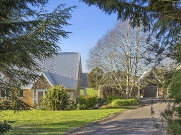 Where Nature Meets Luxury Eco Retreat with Indoor Heated Pool on Over an Acre. Press play and fall in love take the video tour today!
