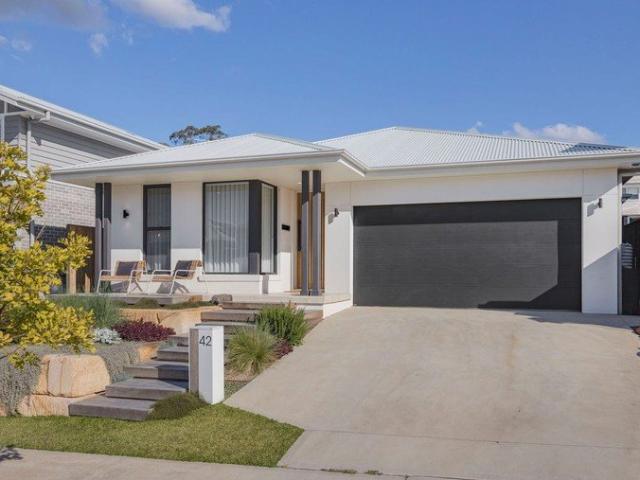 Where Quality, Comfort & Style Come Together in a Standout Home with Exceptional Finishes