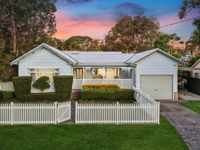White picket lakeside dream