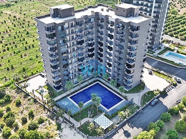 WİN'DEN ÇEŞMELİ'DE SOSYAL DONATILI SATILIK 1+1 DAİRE