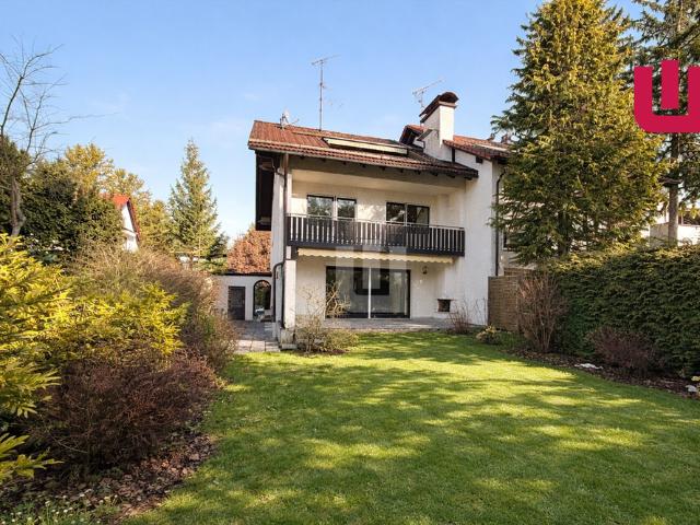 WINDISCH IMMOBILIEN Große DHH mit eingewachsenem Garten und Einliegerwohnung in Gröbenzell Nord