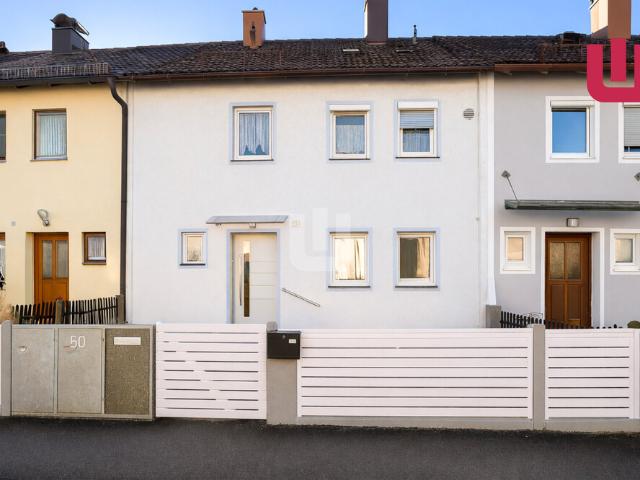 WINDISCH IMMOBILIEN Halbes Reihenhaus mit Garten in guter Lage zum Preis einer Wohnung
