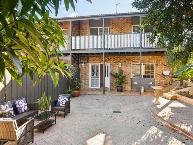 Wide fronted torrens title duplex / leafy courtyards / future potential